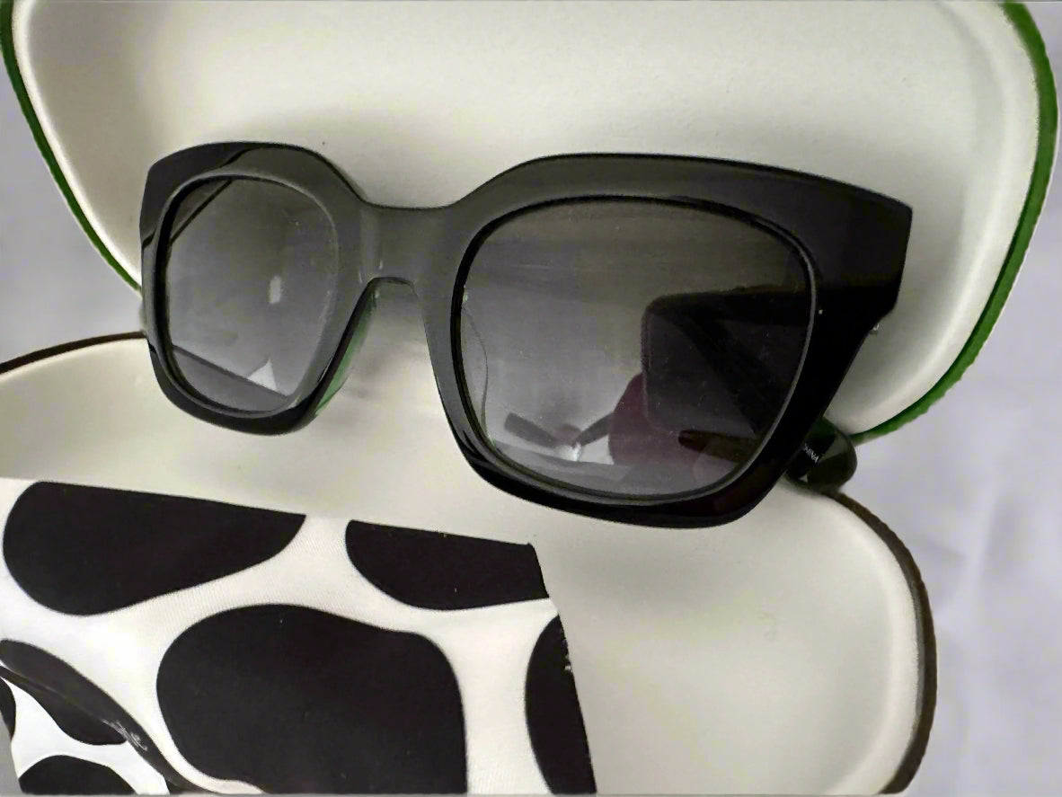 Brand NEW!! Never Worn Kate Spade Sunglasses. Black w green sides/interior