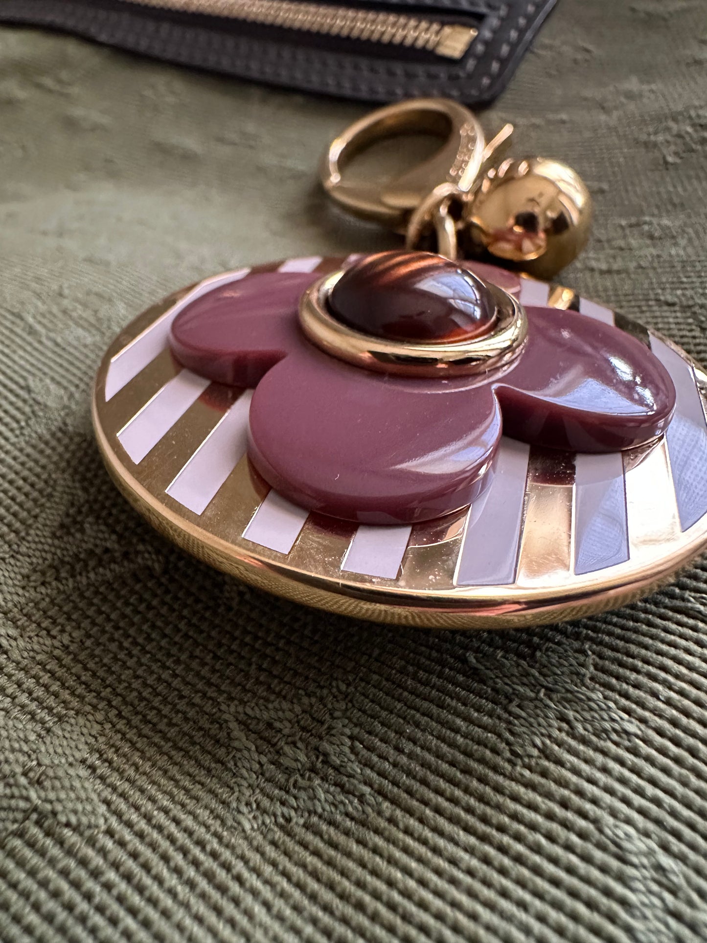 Louis Vuitton Idylle Blossom Bag Charm: in white, gold & plum.