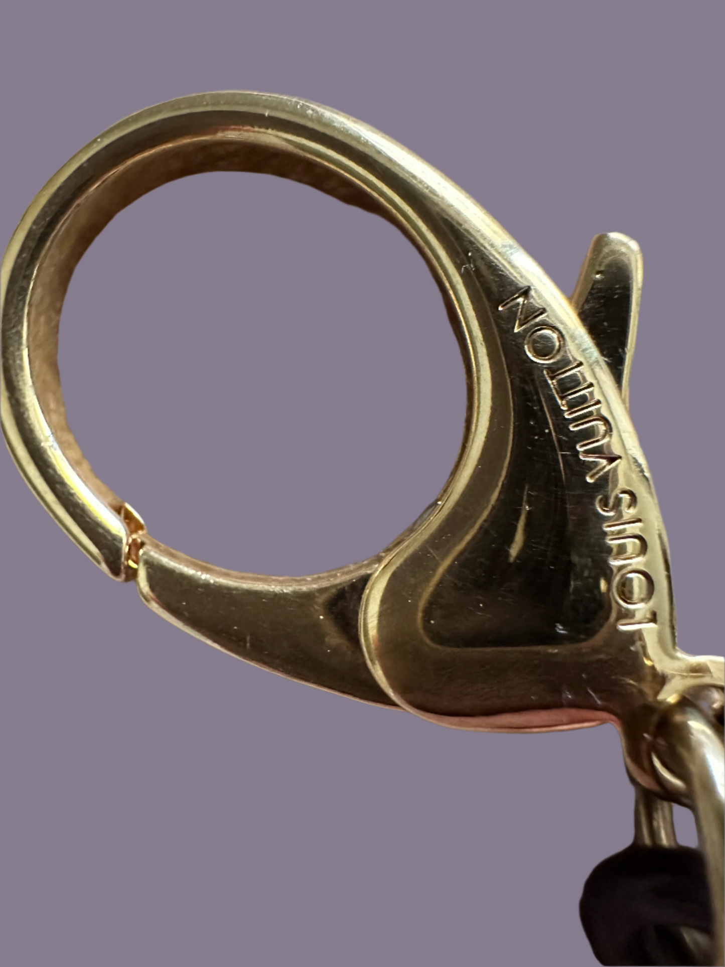 Louis Vuitton Idylle Blossom Bag Charm: in white, gold & plum.