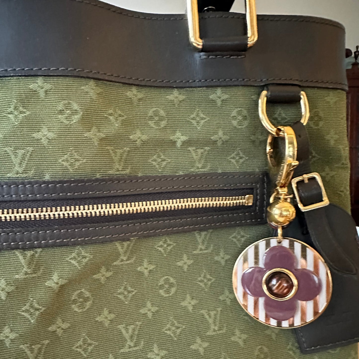 Louis Vuitton Idylle Blossom Bag Charm: in white, gold & plum.