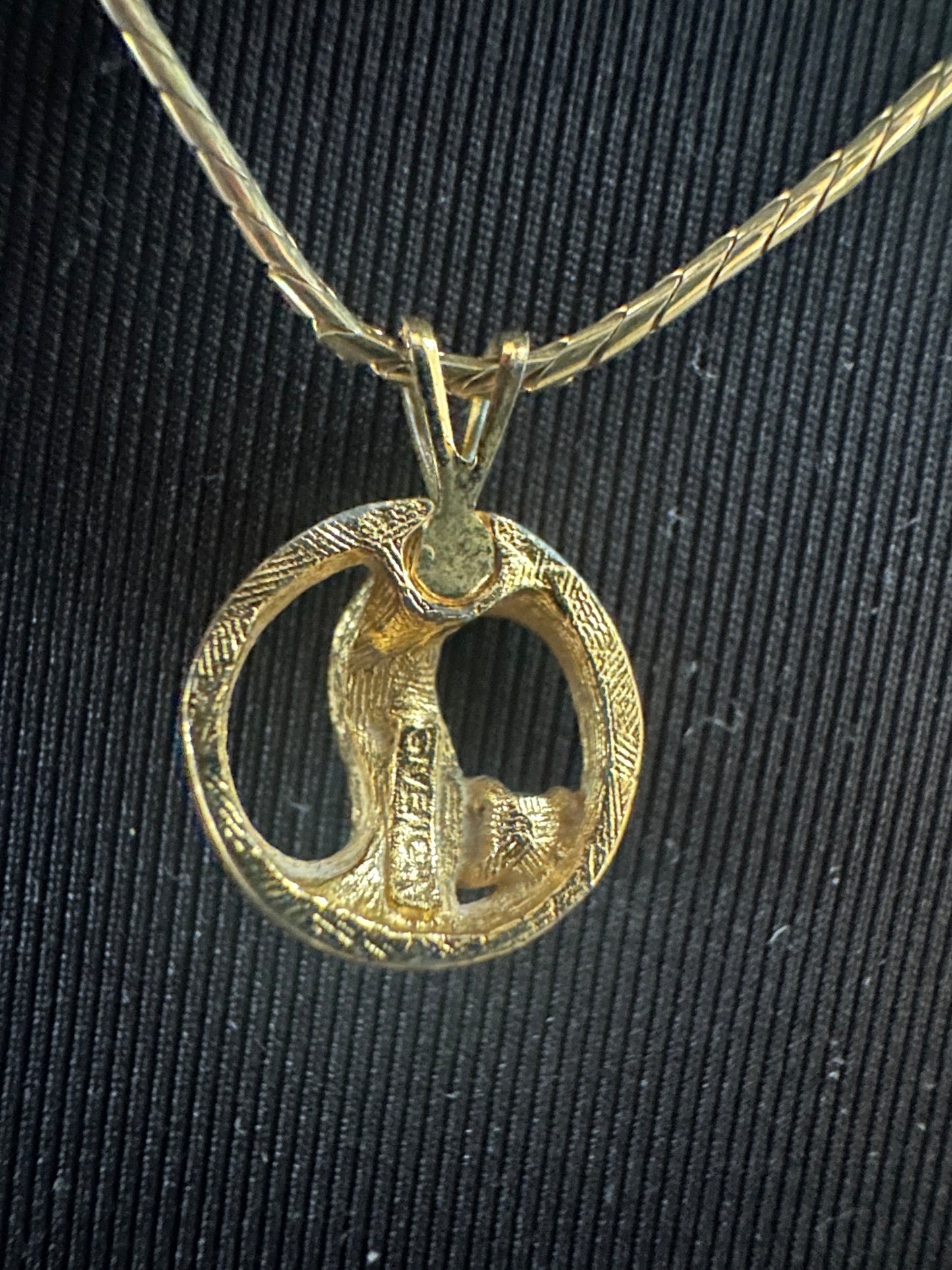 Givency Gold Necklace with Rhinestone and Gold Stamped Pendant: Vintage