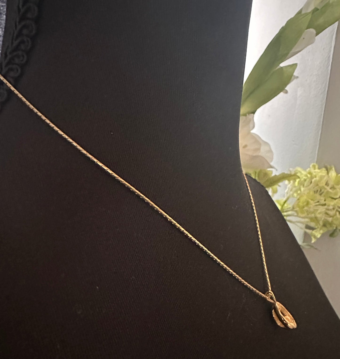 Givency Gold Necklace with Rhinestone and Gold Stamped Pendant: Vintage