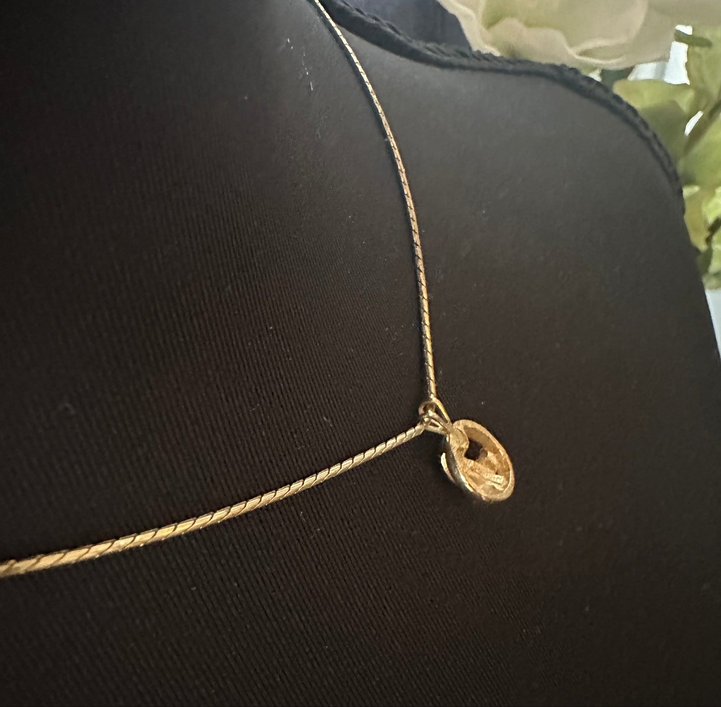Givency Gold Necklace with Rhinestone and Gold Stamped Pendant: Vintage