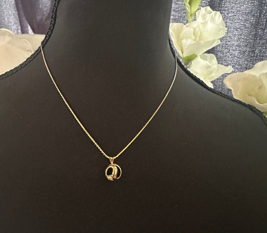 Givency Gold Necklace with Rhinestone and Gold Stamped Pendant: Vintage