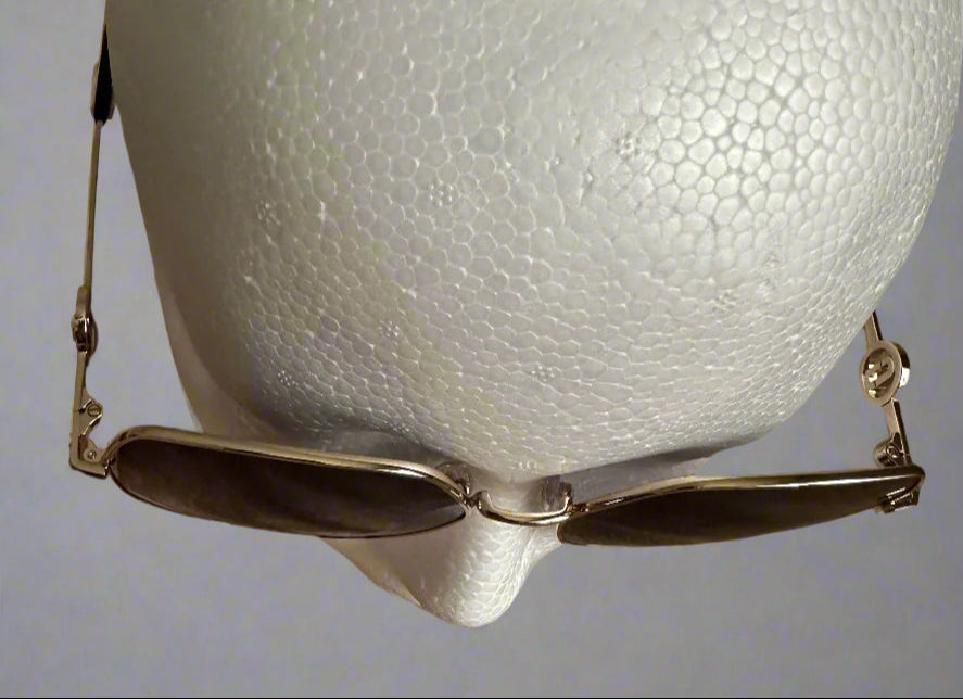 Marc Jacobs gold-rimmed oversized metal frames with MJ medallian on side