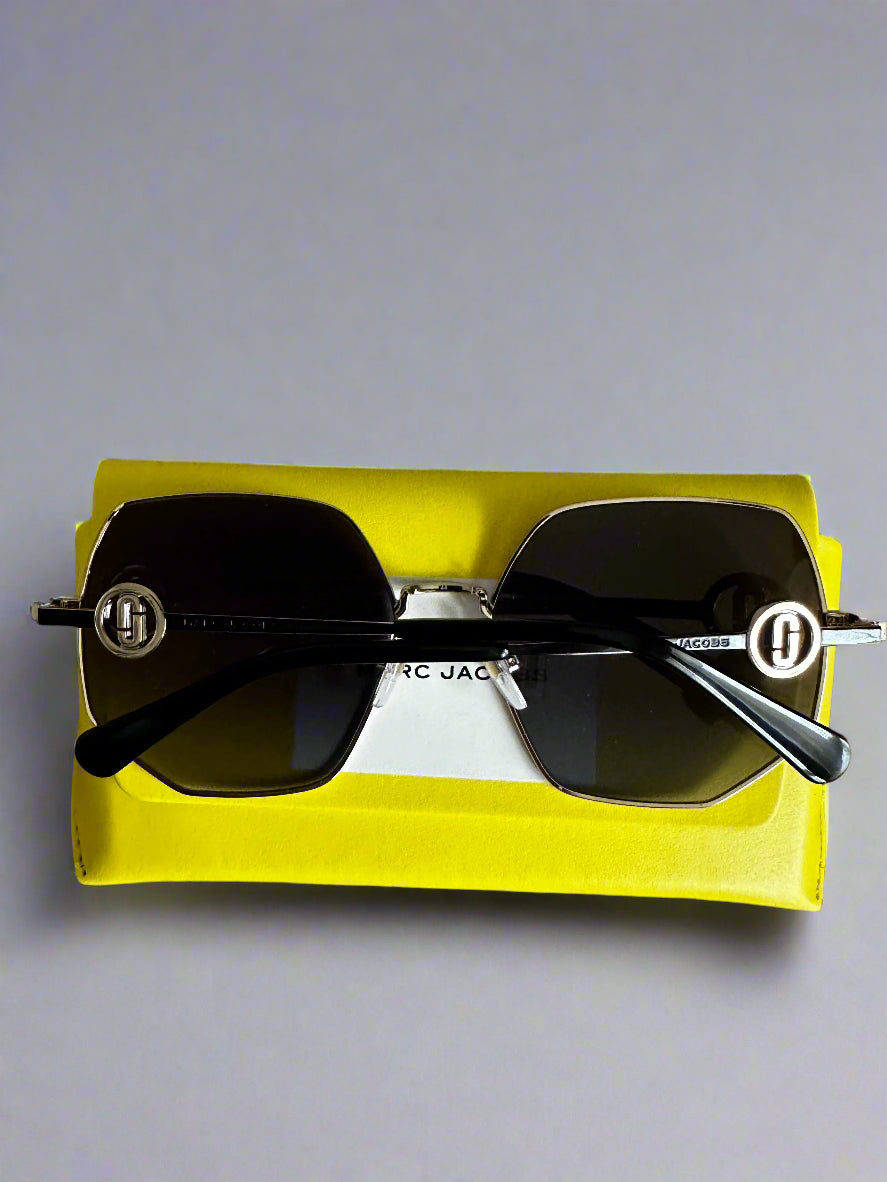 Marc Jacobs gold-rimmed oversized metal frames with MJ medallian on side