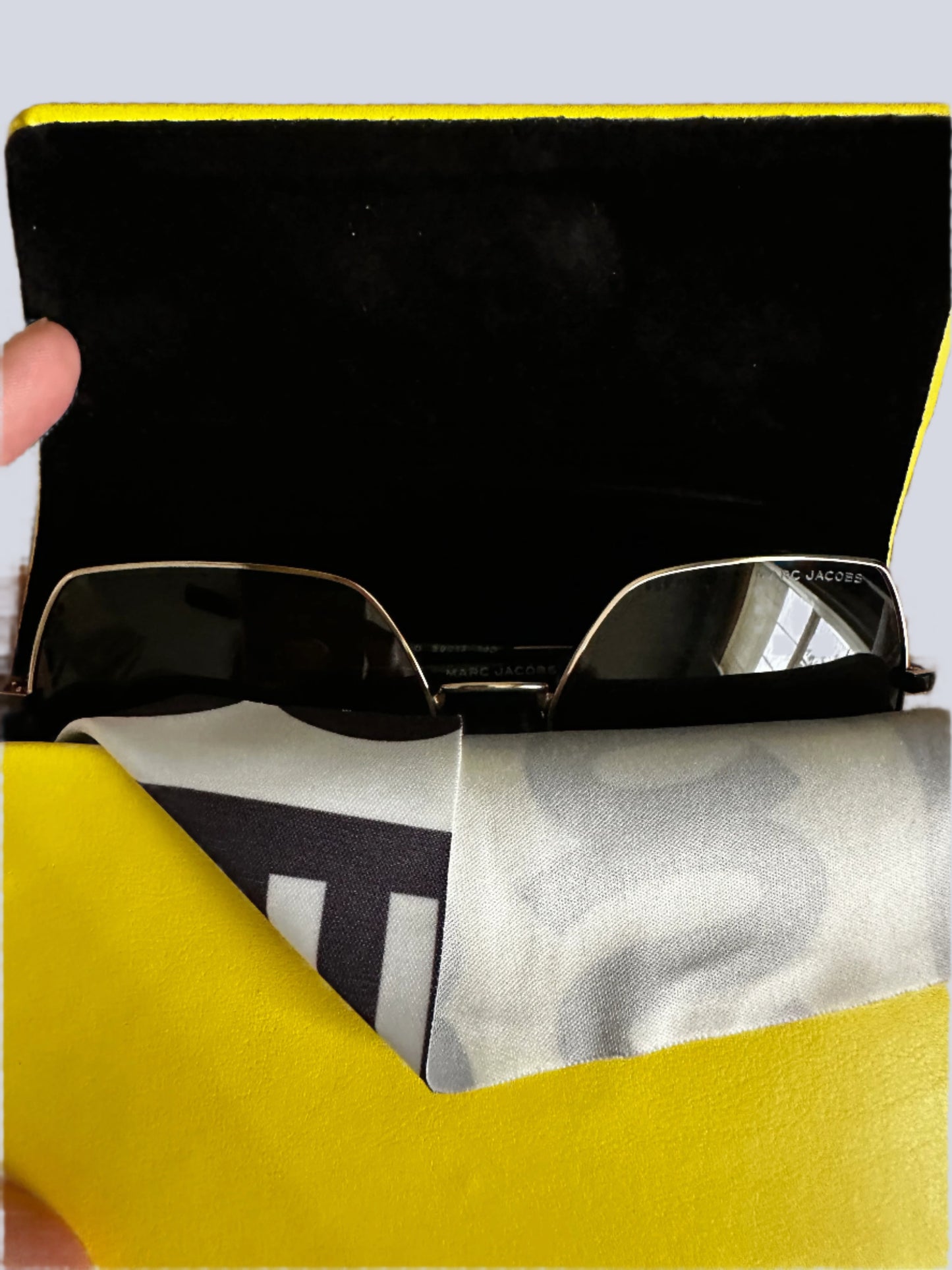 Marc Jacobs gold-rimmed oversized metal frames with MJ medallian on side