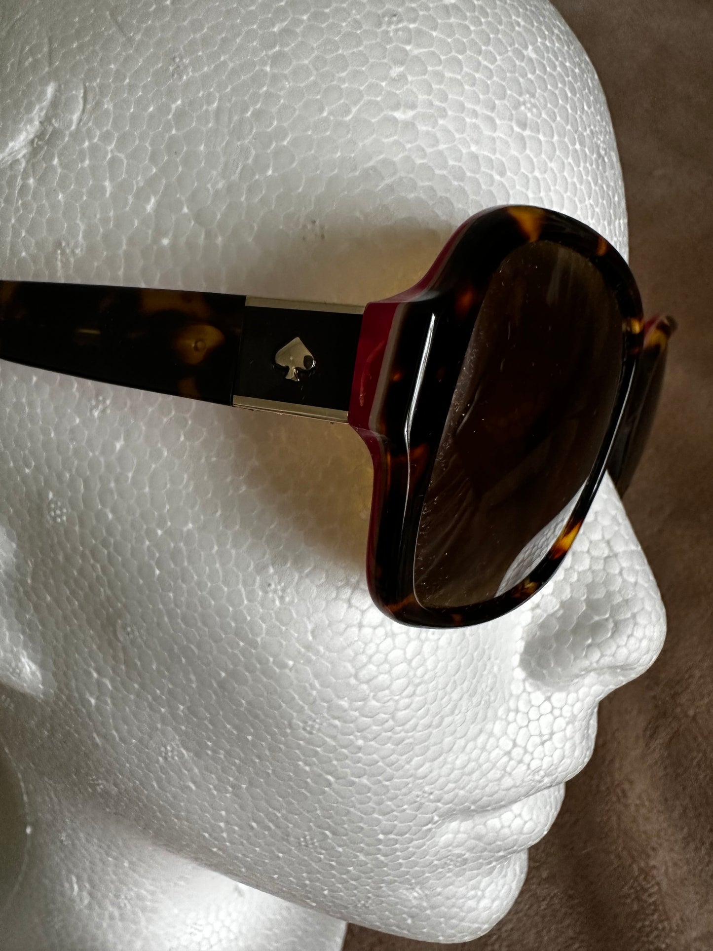 Kate Spade Tortoise Shell Sunglasses with cool rasberry-colored accents