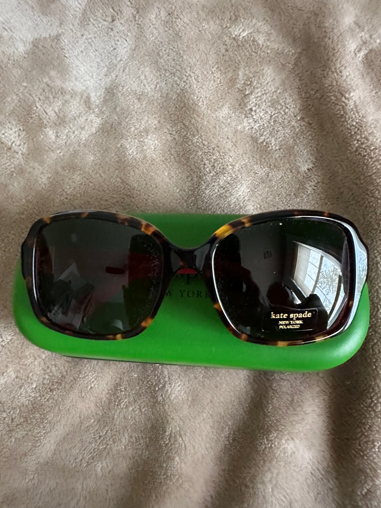 Kate Spade Tortoise Shell Sunglasses with cool rasberry-colored accents