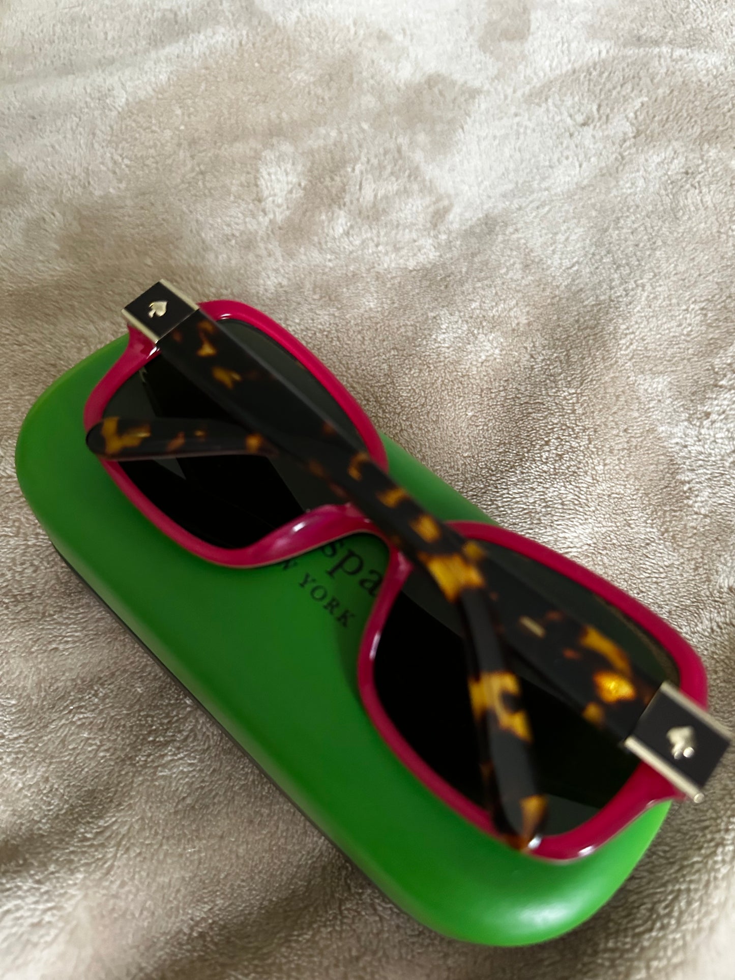 Kate Spade Tortoise Shell Sunglasses with cool rasberry-colored accents