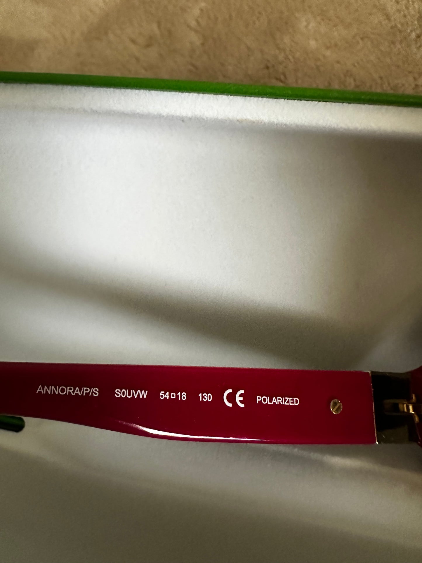 Kate Spade Tortoise Shell Sunglasses with cool rasberry-colored accents