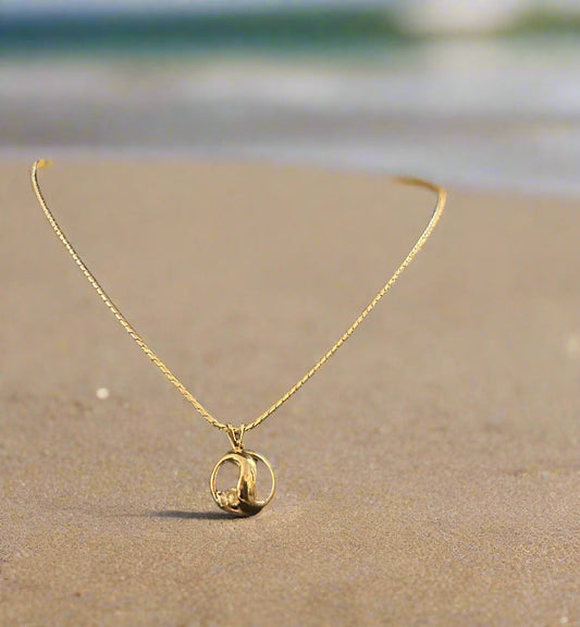 Givency Gold Necklace with Rhinestone and Gold Stamped Pendant: Vintage
